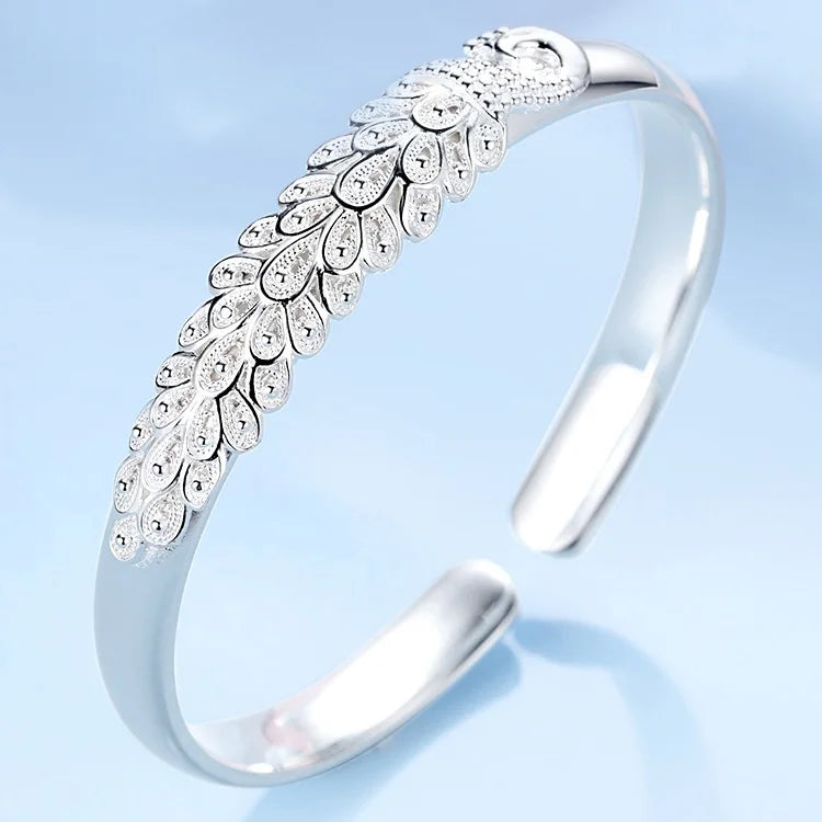 Peacock opening screen bracelet
