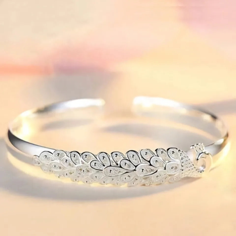 Peacock opening screen bracelet