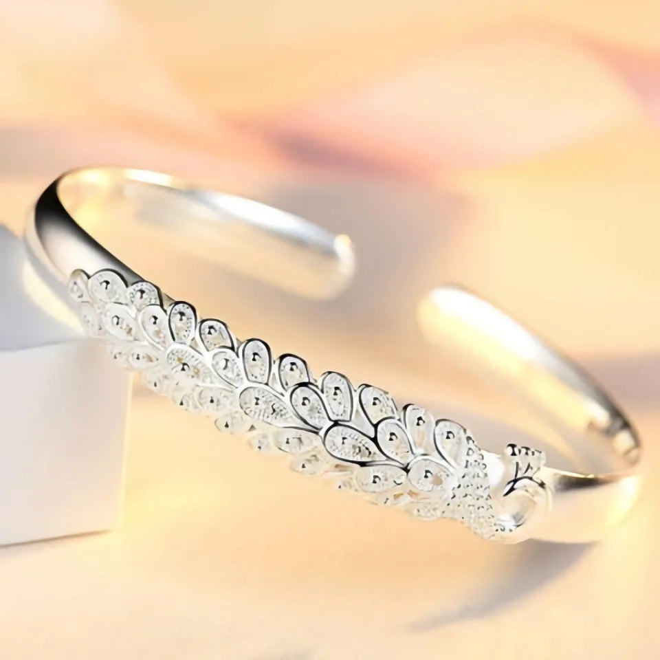 Peacock opening screen bracelet