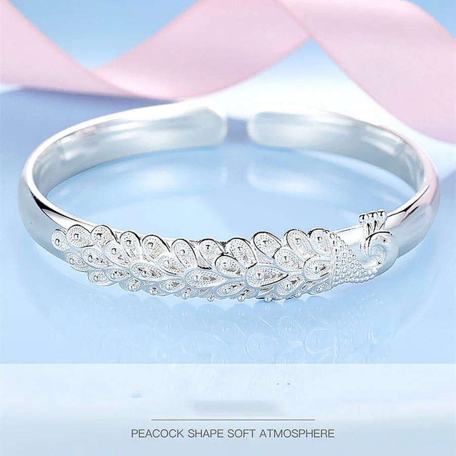 Peacock opening screen bracelet