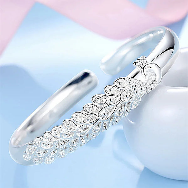 Peacock opening screen bracelet
